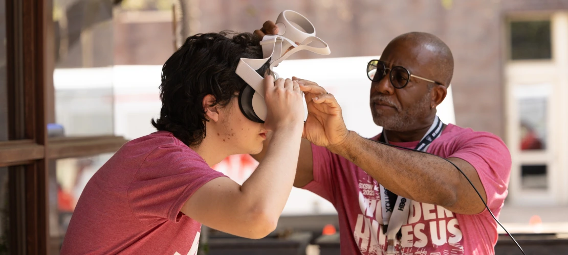 Digital humanities team setting up VR experience