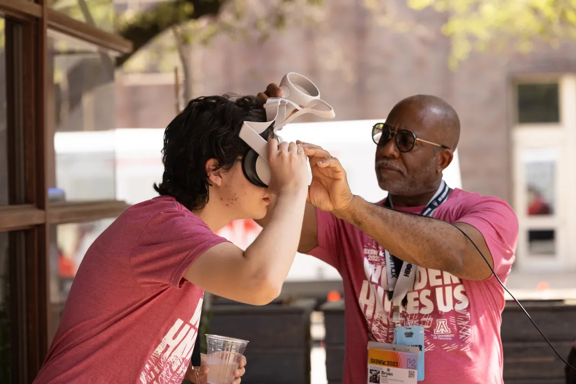 Digital humanities team setting up VR experience